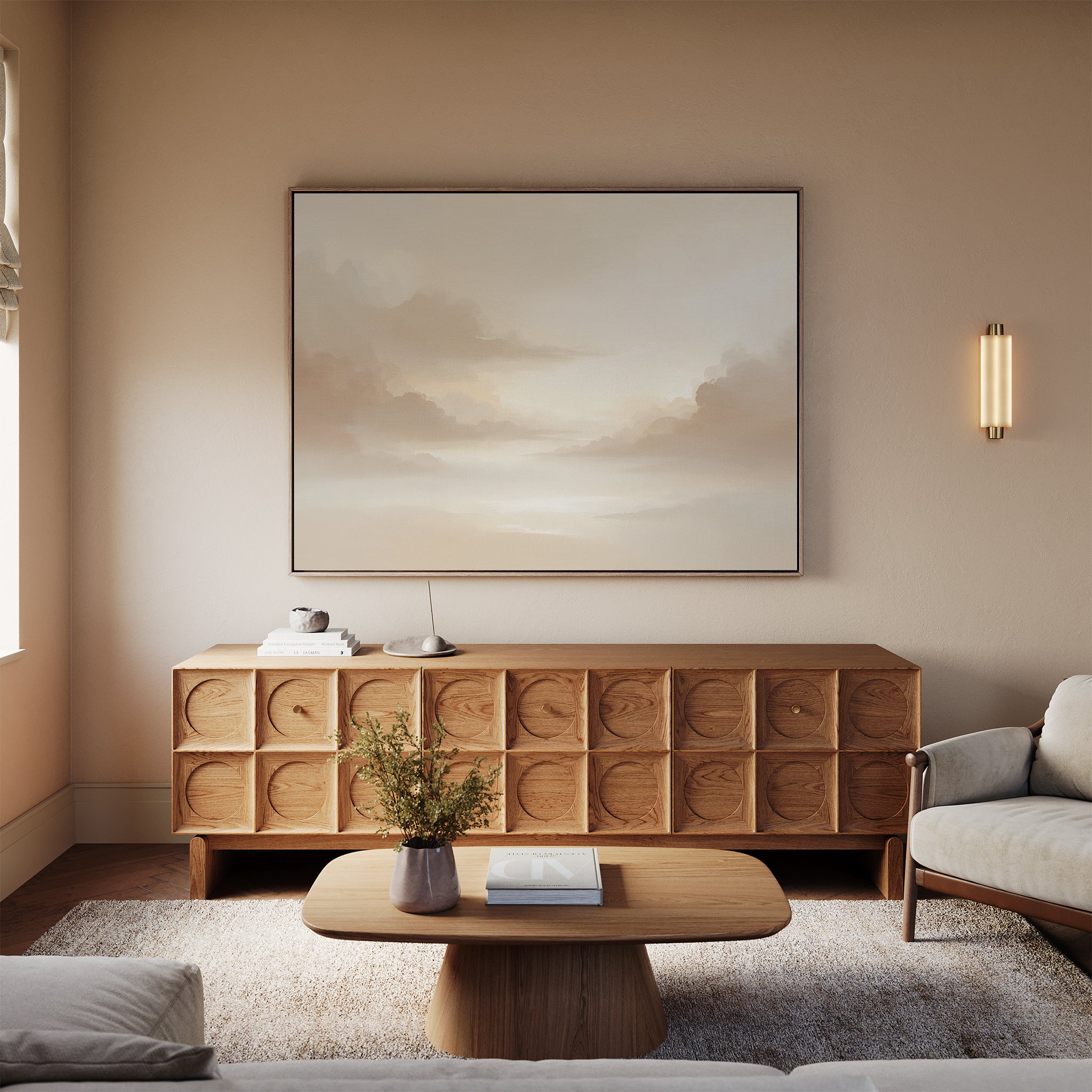 A minimalist living room with a wooden sideboard, Ethereal Veil Canvas Art - Horizontal, modern coffee table, light gray sofa, beige walls, soft rug, and wall sconce creates a calm and elegant atmosphere.