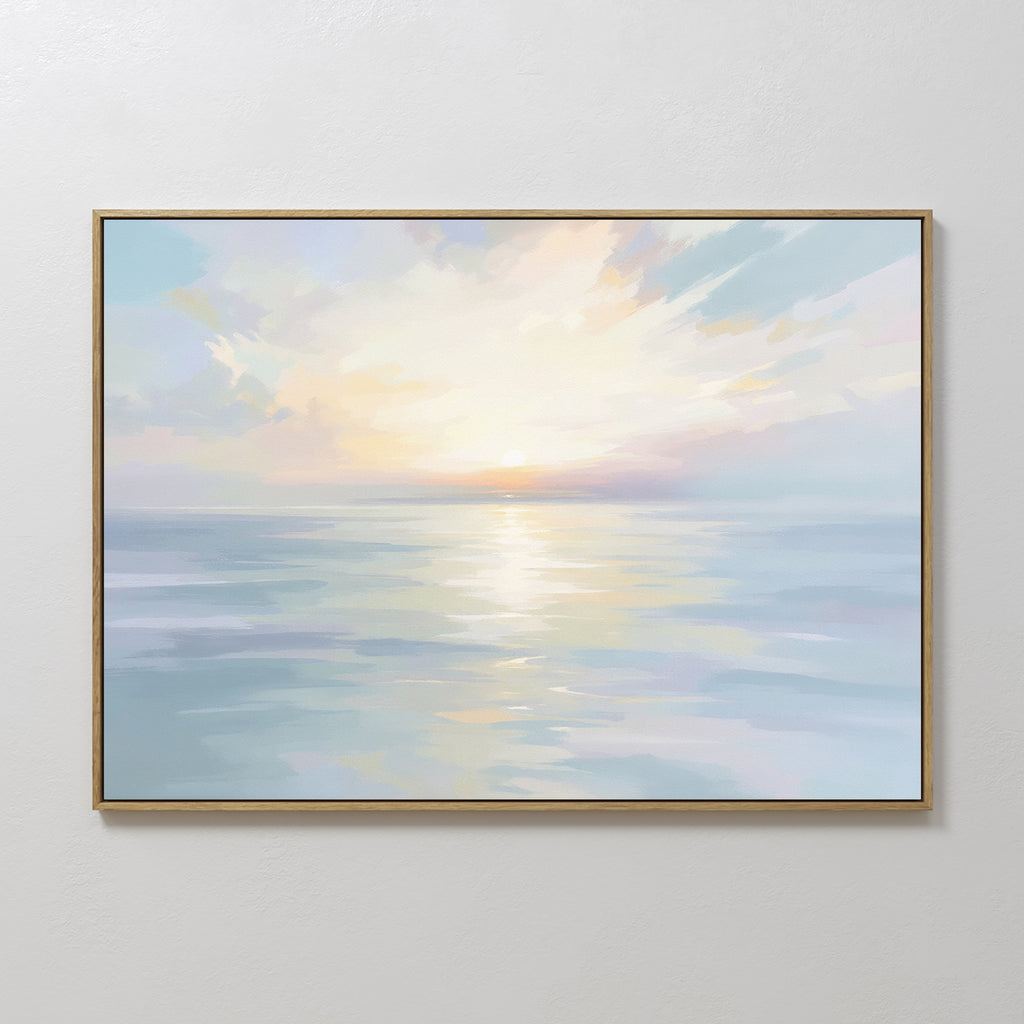 The Ethereal Waters Canvas Art - Horizontal is a framed coastal artwork depicting a serene seascape at sunrise or sunset, with soft pastel hues, gentle clouds, and sunlight reflecting on calm water.