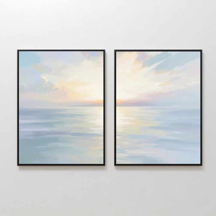The Ethereal Waters - Set of 2 features framed paintings of a calm ocean beneath a pastel sky with sunlight on the water, creating serene coastal wall art that brings tranquility to any space.