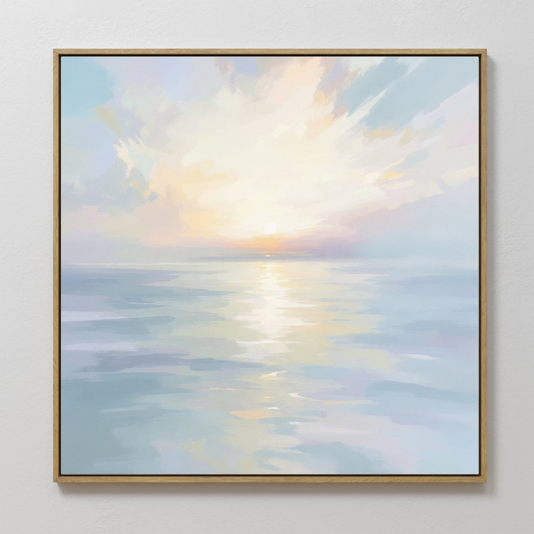 The Ethereal Waters Canvas Art - Square features a tranquil sunrise or sunset over calm water, with pastel hues and light clouds—a serene, framed wall art piece that adds calming beauty to any room.