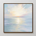 The Ethereal Waters Canvas Art - Square features a framed seascape of calm ocean waves and a pastel sky, bringing serene, coastal charm and a peaceful atmosphere to any space.