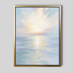 The Ethereal Waters Canvas Art - Vertical adds tranquil coastal beauty to a plain light gray wall with its serene pastel seascape and gentle sunlight reflections.