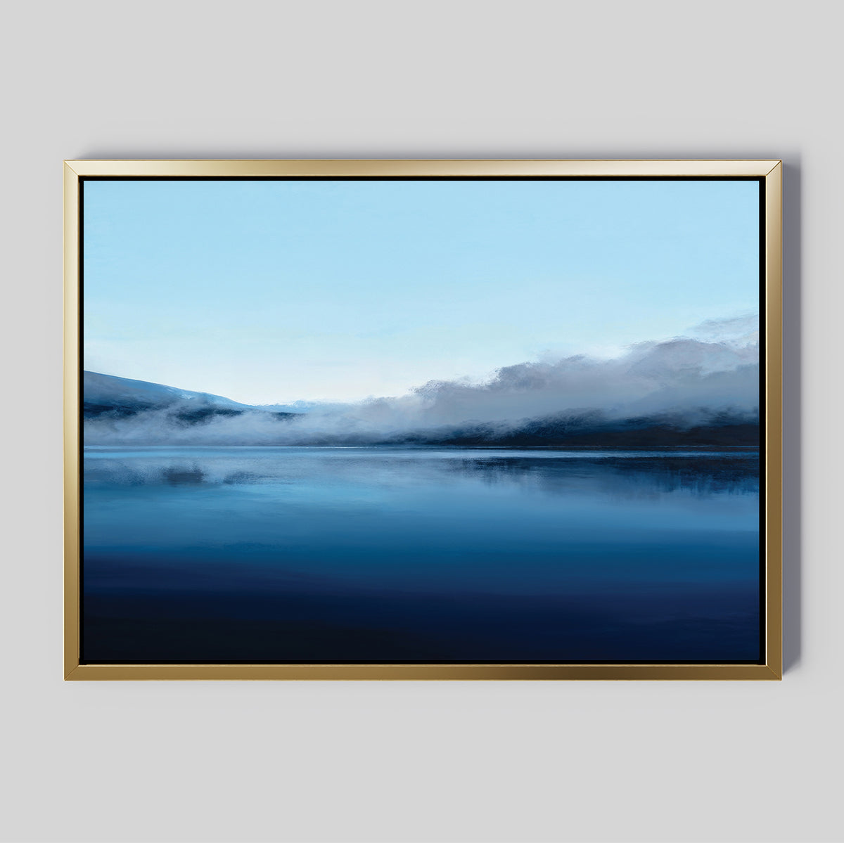 The Fjord Mist Canvas Art - Horizontal features a serene landscape of a calm blue lake with mountains and fog in cool tones, ideal for tranquil home decor and stunning on any plain gray wall.
