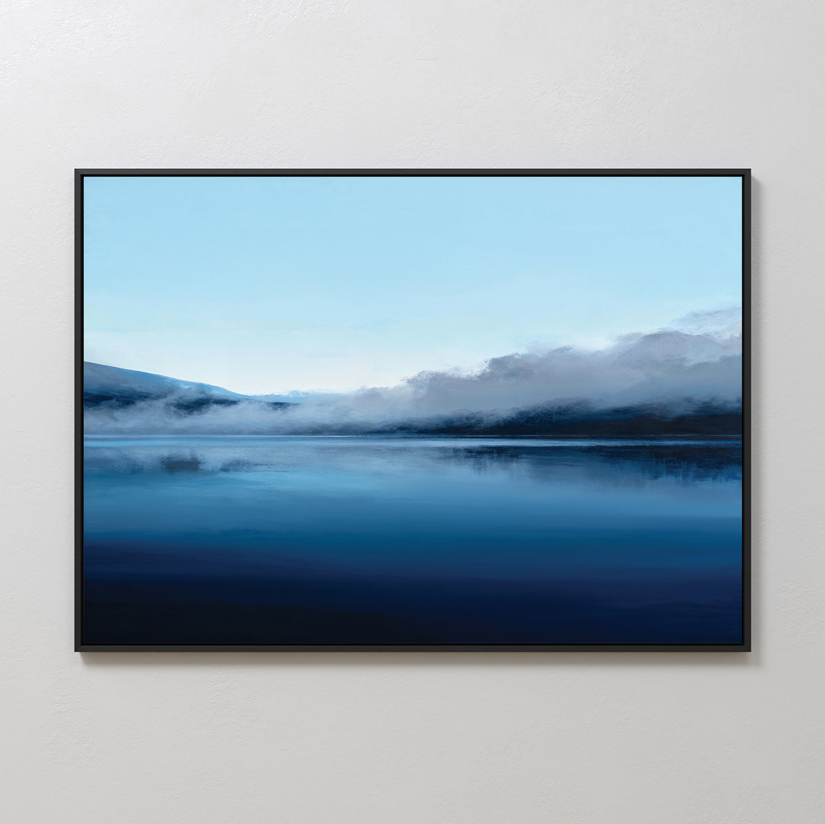 The Fjord Mist Canvas Art - Horizontal features a serene landscape of a calm lake and misty mountains under a clear blue sky, with soft blue and white gradients—ideal for tranquil home decor.