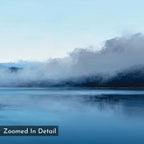 The Fjord Mist Canvas Art - Square features a serene lakeside with mist over dark hills and calm blue water beneath a pale sky, perfect as Nordic wall art. "Zoomed In Detail" is labeled in the corner.