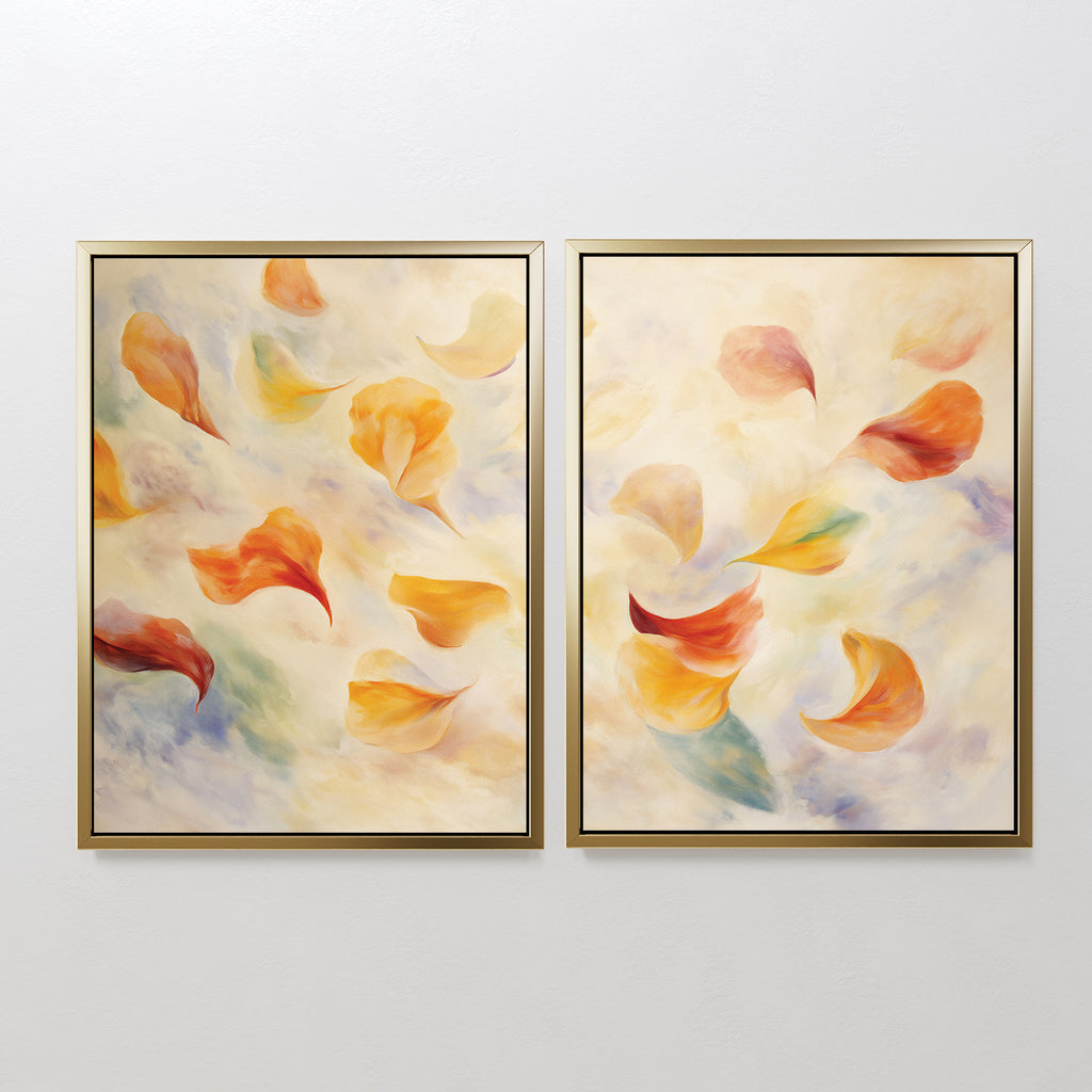 The Floating Petals - Set of 2 features framed canvas prints with swirling, colorful petals in yellow, orange, and red on a soft background, adding organic elegance to any white wall.