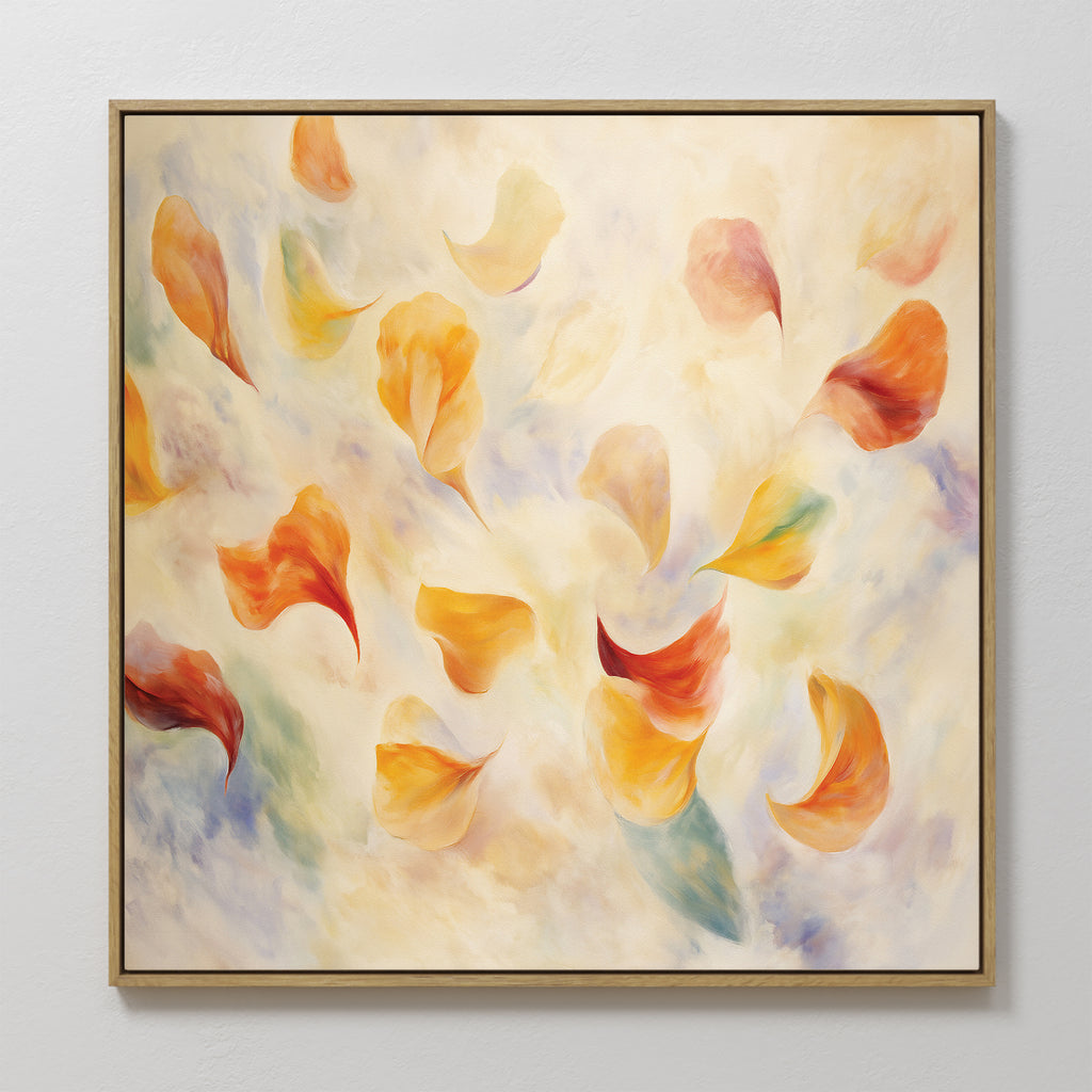 The Floating Petals Canvas Art - Square showcases swirling orange, yellow, and red petals on a soft background. This abstract framed print brings organic elegance and movement to any space.