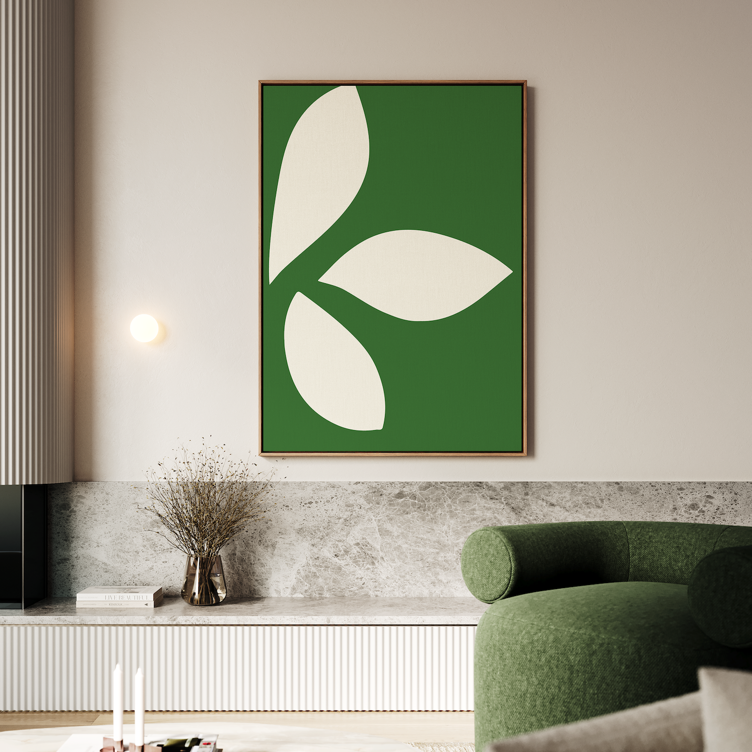 A modern living room featuring a green sofa, marble ledge, small vase of dried flowers, and the Leaf Silhouette Abstract Canvas Art—ideal for anyone looking to add modern elegance to their living room decor.