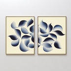 Flowing Shadows - Set of 2 showcases abstract framed canvas prints with leaf-like shapes in deep indigo on a cream background, creating dynamic and modern wall art ideal for contemporary living room decor.