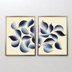 Flowing Shadows - Set of 2: Framed abstract canvas prints with overlapping blue and gray leaf-inspired shapes on a beige background, perfect minimalist indigo wall art to elevate your modern living room decor.