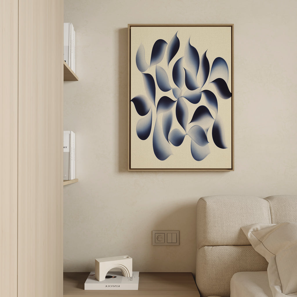 Minimalist living room with a beige sofa, Flowing Shadows Canvas Art - Vertical in calming blue tones on the wall, a wooden bookshelf on the left, and a small white decorative object on a low table—ideal for modern decor.