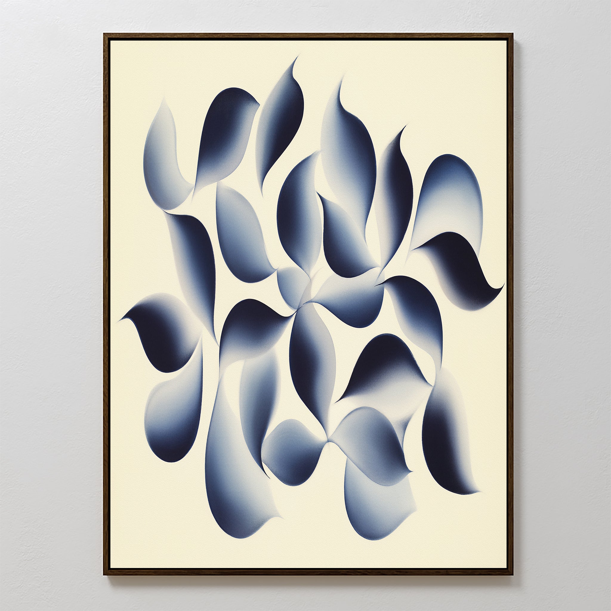 Flowing Shadows Canvas Art - Vertical features soft, gradient navy shapes resembling petals or leaves on a cream background with a thin dark frame—ideal as calming modern wall art for your living room.