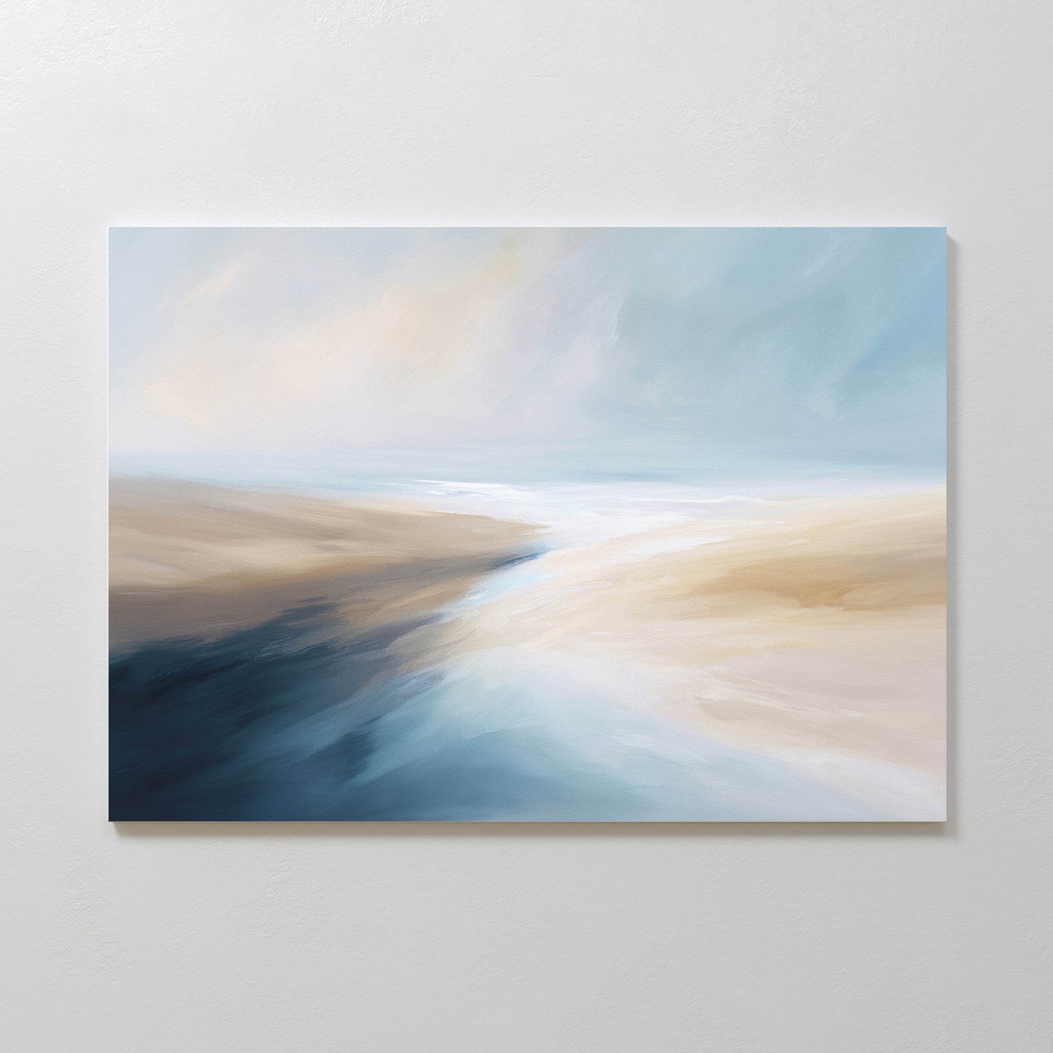 Fluid Motion Canvas Art - Horizontal features soft beige, blue, and white tones blending to evoke a tranquil sky and flowing water over sand—perfect for adding a calming coastal touch to modern living rooms.
