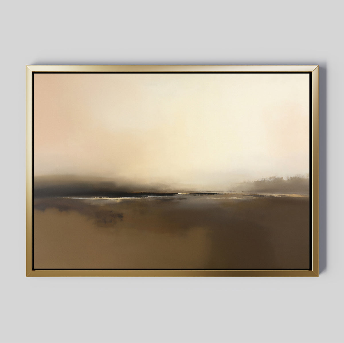 The Foggy Beach Expanse Canvas Art - Horizontal features warm beige and brown hues, evoking a serene landscape or misty coast. Softly blended areas suggest coastal wall art, beautifully displayed in a gold frame on a light gray wall.