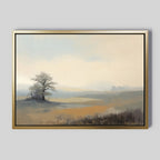 The Foggy Solitude Canvas Art - Horizontal showcases a serene scene of a lone tree on a grassy field with misty hills and a soft sky, using muted colors for a peaceful mood—ideal as tranquil bedroom decor.
