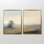 The “Foggy Solitude - Set of 2” features framed misty landscape art prints with a lone tree and open fields under a cloudy sky in muted earth tones, creating tranquil, impressionistic wall decor.