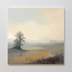 The Foggy Solitude Canvas Art - Square features a soft, misty landscape with a solitary tree on a hill, capturing Nordic Park’s calm essence in soothing beige, green, and gray tones under a hazy sky.