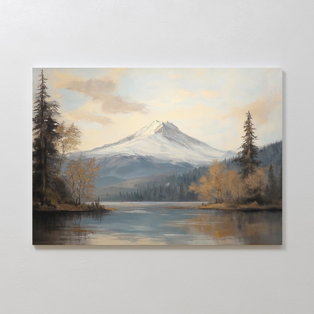 The Frosted Ascent Canvas Art - Horizontal depicts a serene Nordic Park mountain landscape with a snow-capped peak, evergreen trees, and a calm lake reflecting the scenery beneath a partly cloudy sky.