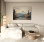 A modern living room with a light beige sectional, a wooden coffee table and black bowl, and the Frosted Ascent Canvas Art - Horizontal above the sofa. Sunlight filters in through a window dressed with beige curtains.