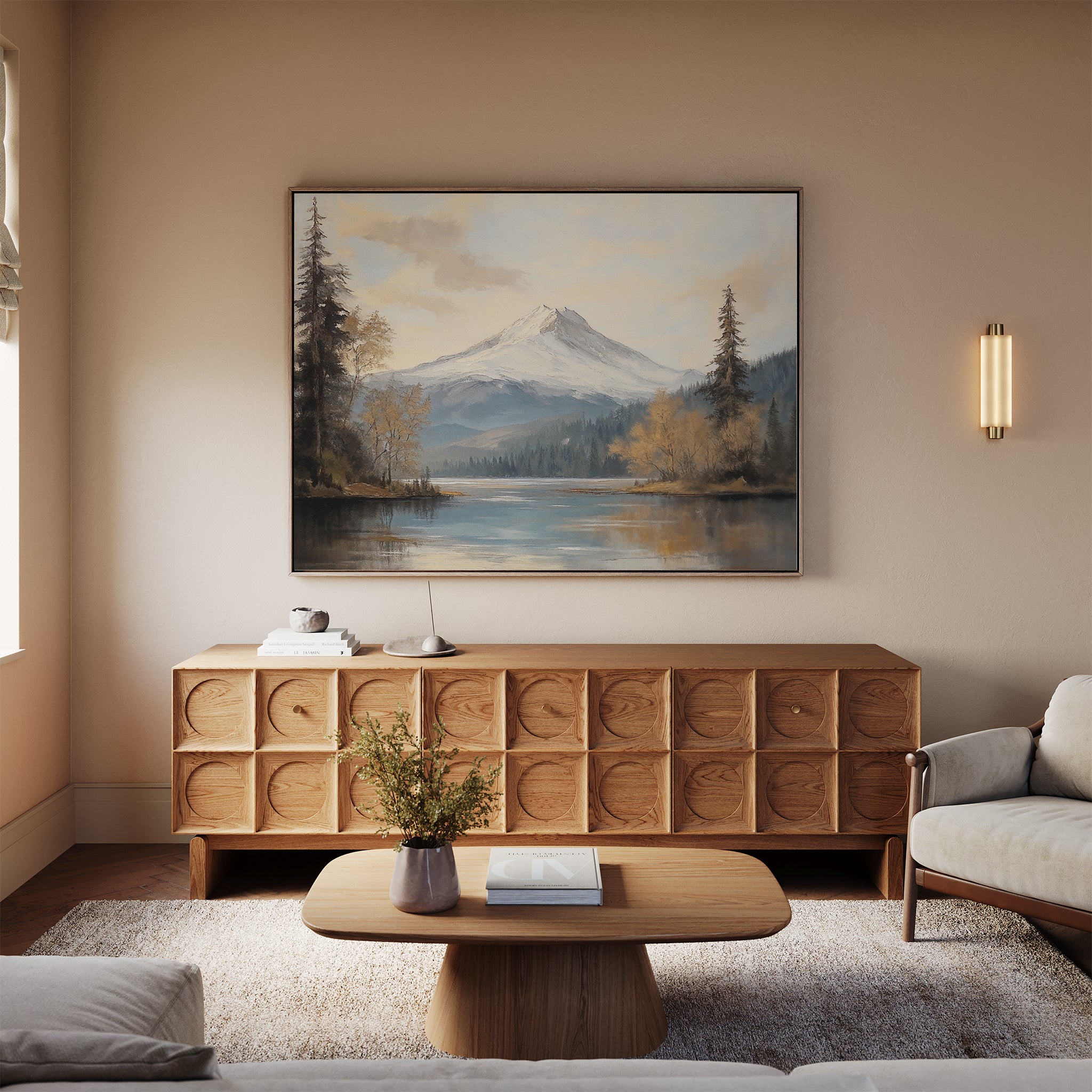 A cozy living room features a light sofa, wooden coffee table, patterned sideboard, and wall lamp. Above the sideboard hangs the Frosted Ascent Canvas Art - Horizontal, capturing tranquil beauty. A small vase with flowers completes the Nordic Park vibe.