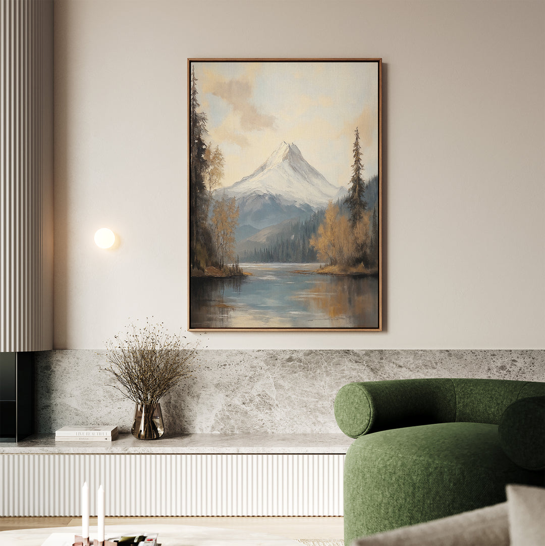 A living room with a green sofa, marble accents, and tranquil decor featuring the Frosted Ascent Canvas Art - Vertical above a shelf with a vase of dried branches.