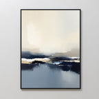 Frozen Bay Canvas Art - Vertical features soft, blurred shapes in blue, white, beige, and black for a serene winter waters look. Elegantly framed in thin black and mounted on a light wall—ideal for modern living room decor.