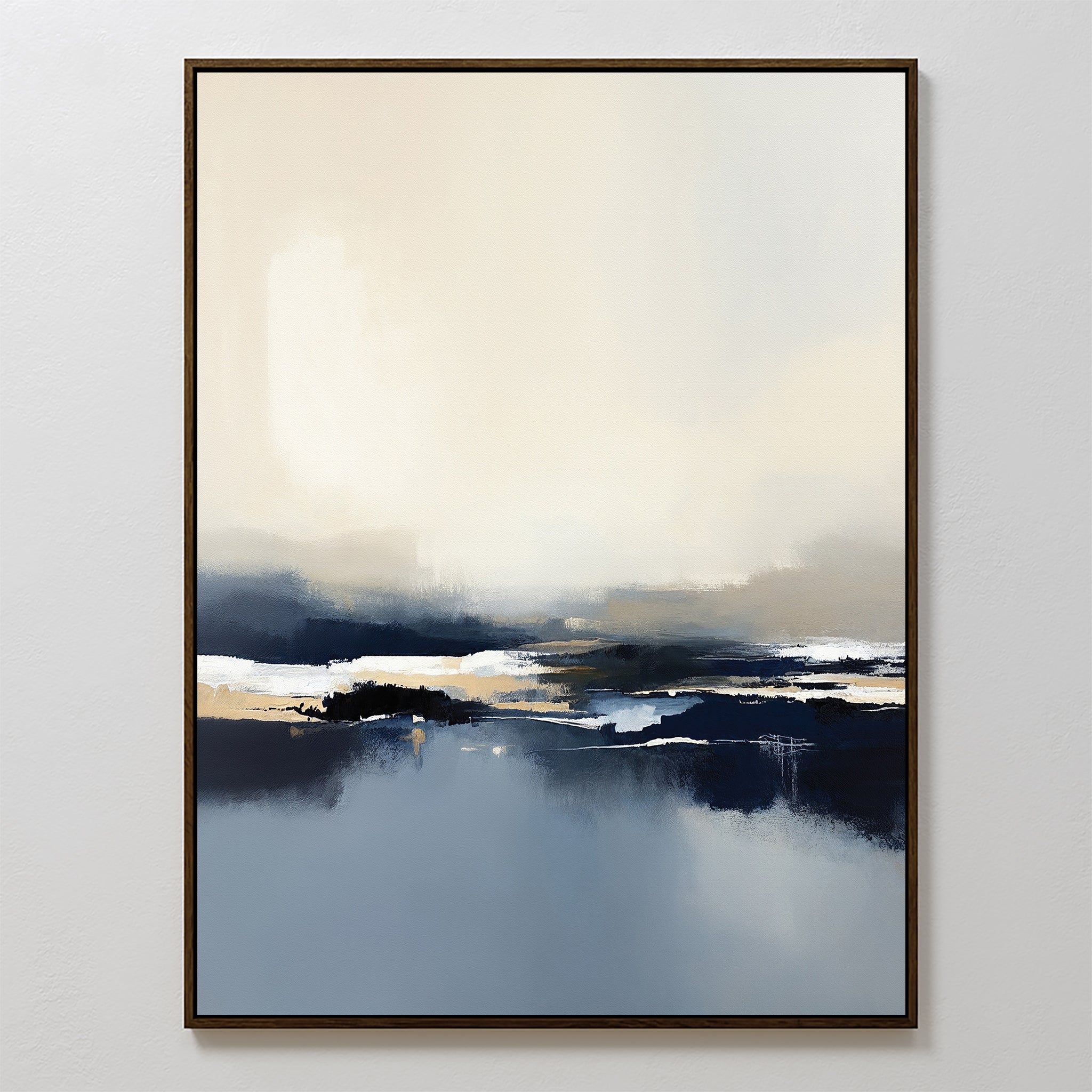 The Frozen Bay Canvas Art - Vertical features soft, blurred shades of cream, beige, navy blue, and black. This serene abstract print adds a contemporary touch to any modern living room when framed and displayed on a white wall.