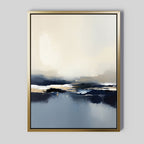 Frozen Bay Canvas Art - Vertical features soft, blended blue, beige, and white tones that evoke a misty seascape. Displayed in a slim gold frame on a light gray wall, it’s perfect for elevating modern living room decor.