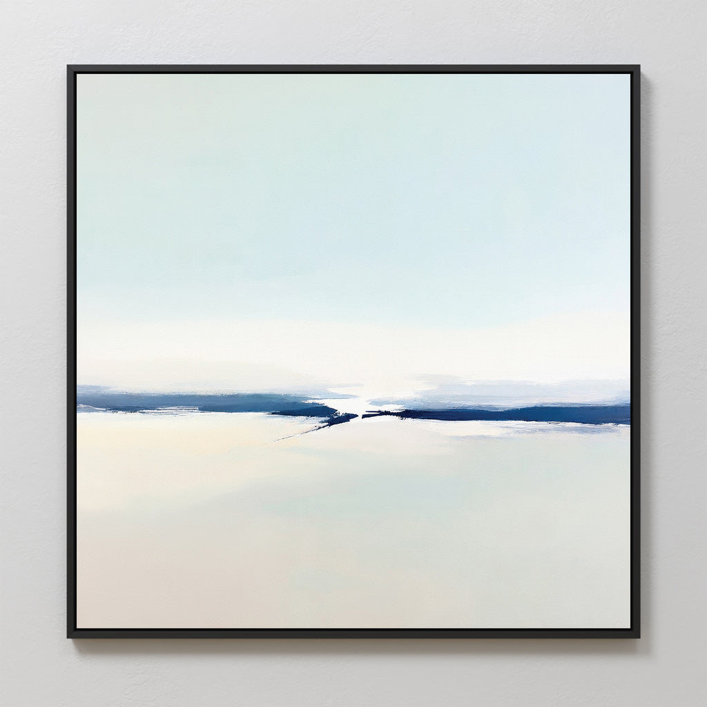The Frozen Channel Canvas Art - Square showcases minimalist abstract design with soft white, beige, and light blue tones and a bold dark blue band. Framed in slim black, it adds serene elegance to modern living rooms against light-colored walls.