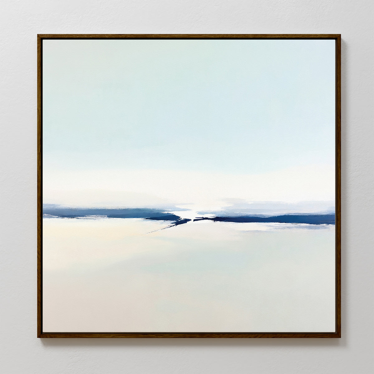 Frozen Channel Canvas Art - Square: This minimalist wall print features soft white, cream, and light blue gradients with a bold blue streak in a brown frame, evoking a tranquil landscape—perfect modern decor for your living room.