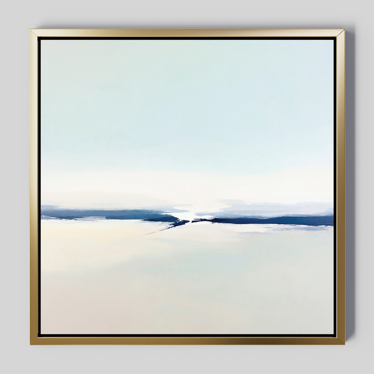 Frozen Channel Canvas Art - Square features soft, blended tones of light blue, white, and beige with a bold horizontal dark blue streak. This minimalist piece is framed in gold and perfect for adding modern elegance to a light gray living room wall.