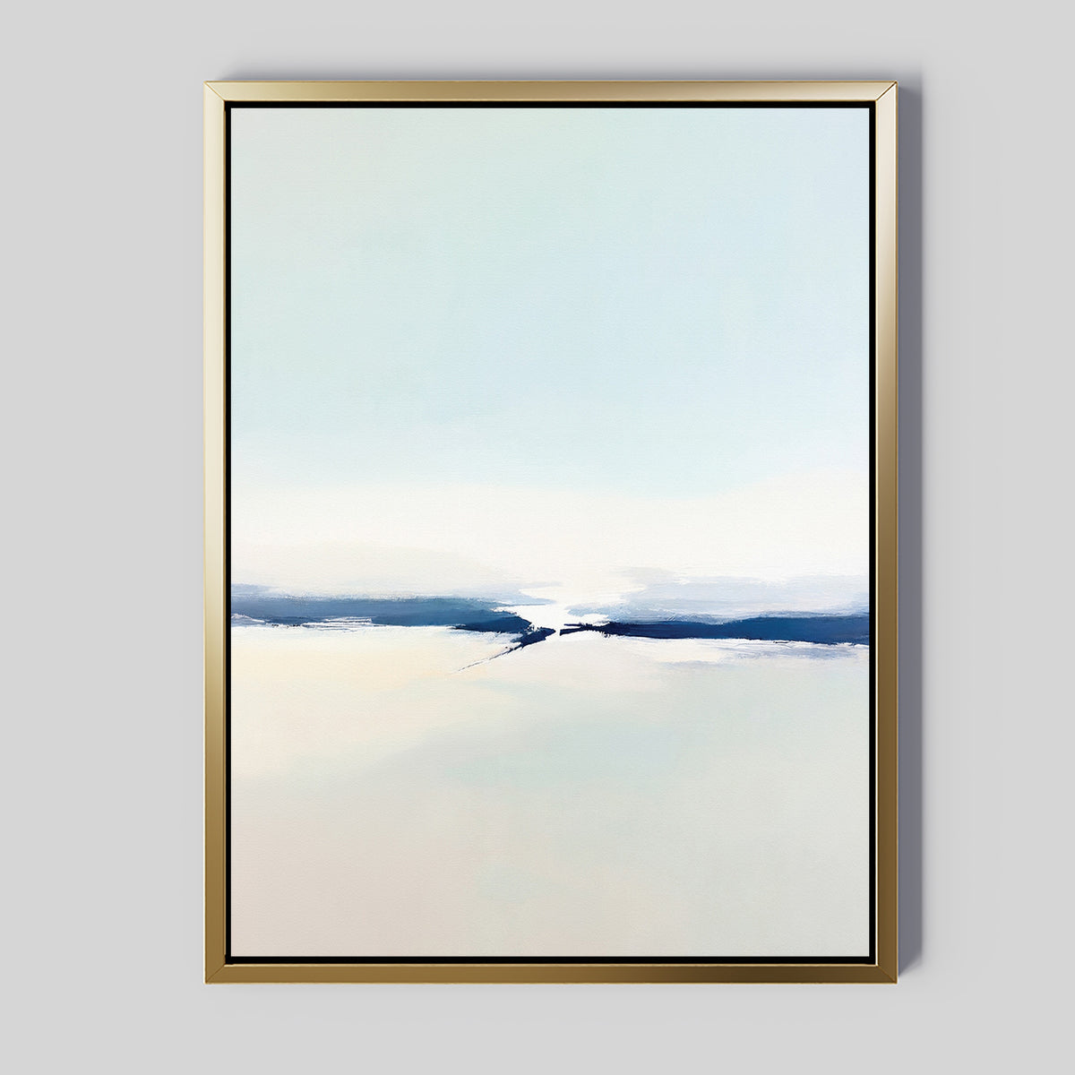 Frozen Channel Canvas Art - Vertical features soft blue and beige tones with a bold dark blue brushstroke. Set against a light gray background and framed in gold, this modern abstract print brings serene style to any living room.