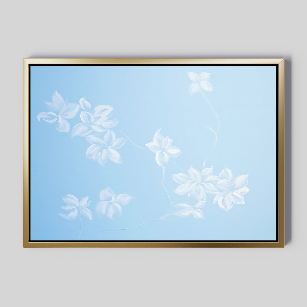 The Gentle Blossoms Canvas Art - Horizontal features delicate white flowers and vines on a soft light blue background in a gold frame, bringing an airy, minimalist elegance to any room.