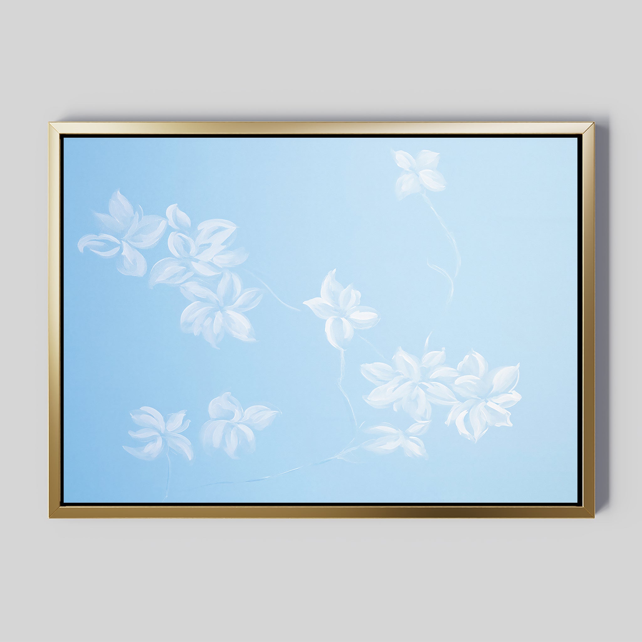 The Gentle Blossoms Canvas Art - Horizontal features delicate white flowers and vines on a soft light blue background in a gold frame, bringing an airy, minimalist elegance to any room.