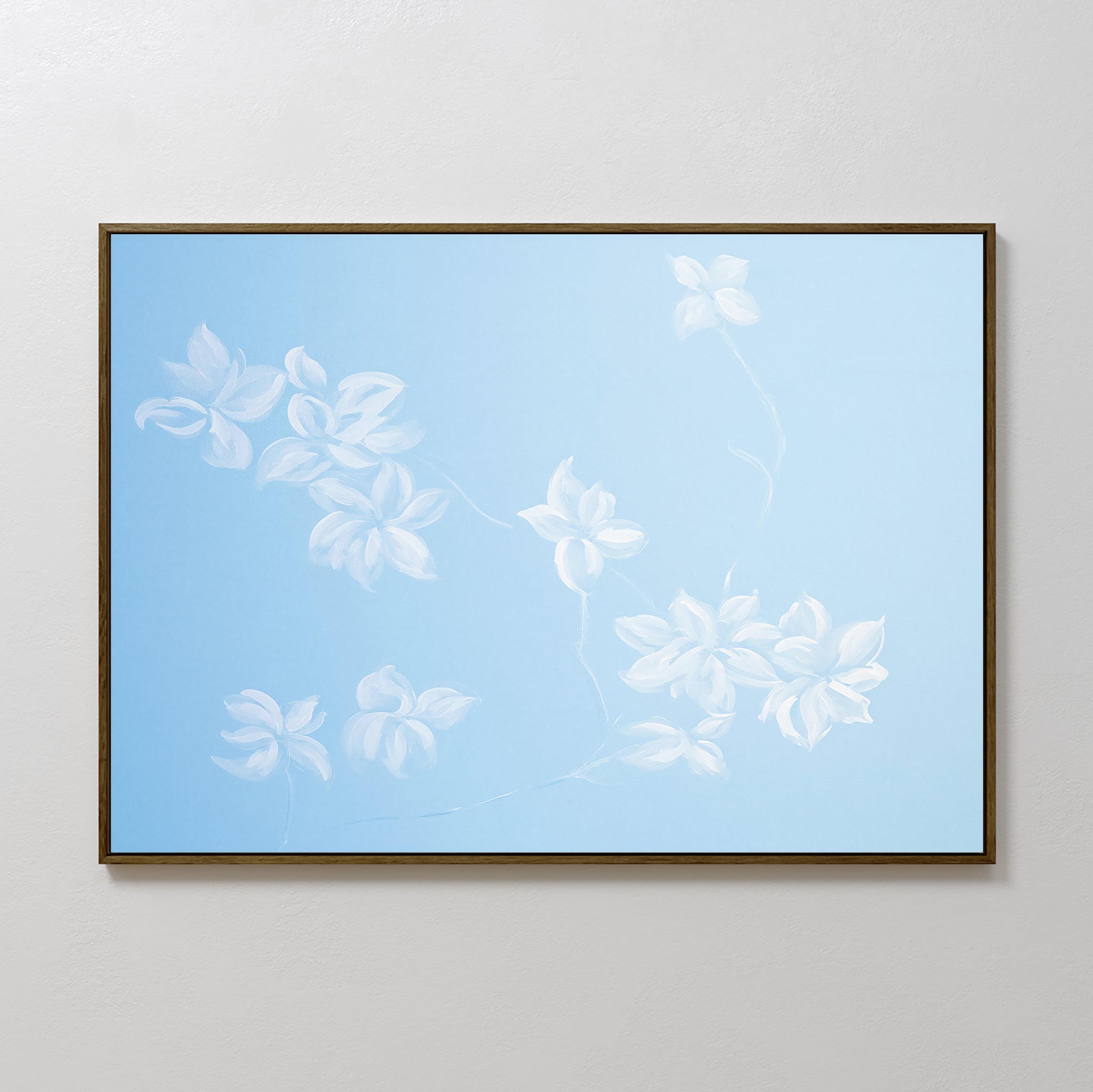 The Gentle Blossoms Canvas Art - Horizontal features delicate white flowers with soft petals on thin stems set against a light blue background, adding subtle floral motifs to any plain, light-colored wall.