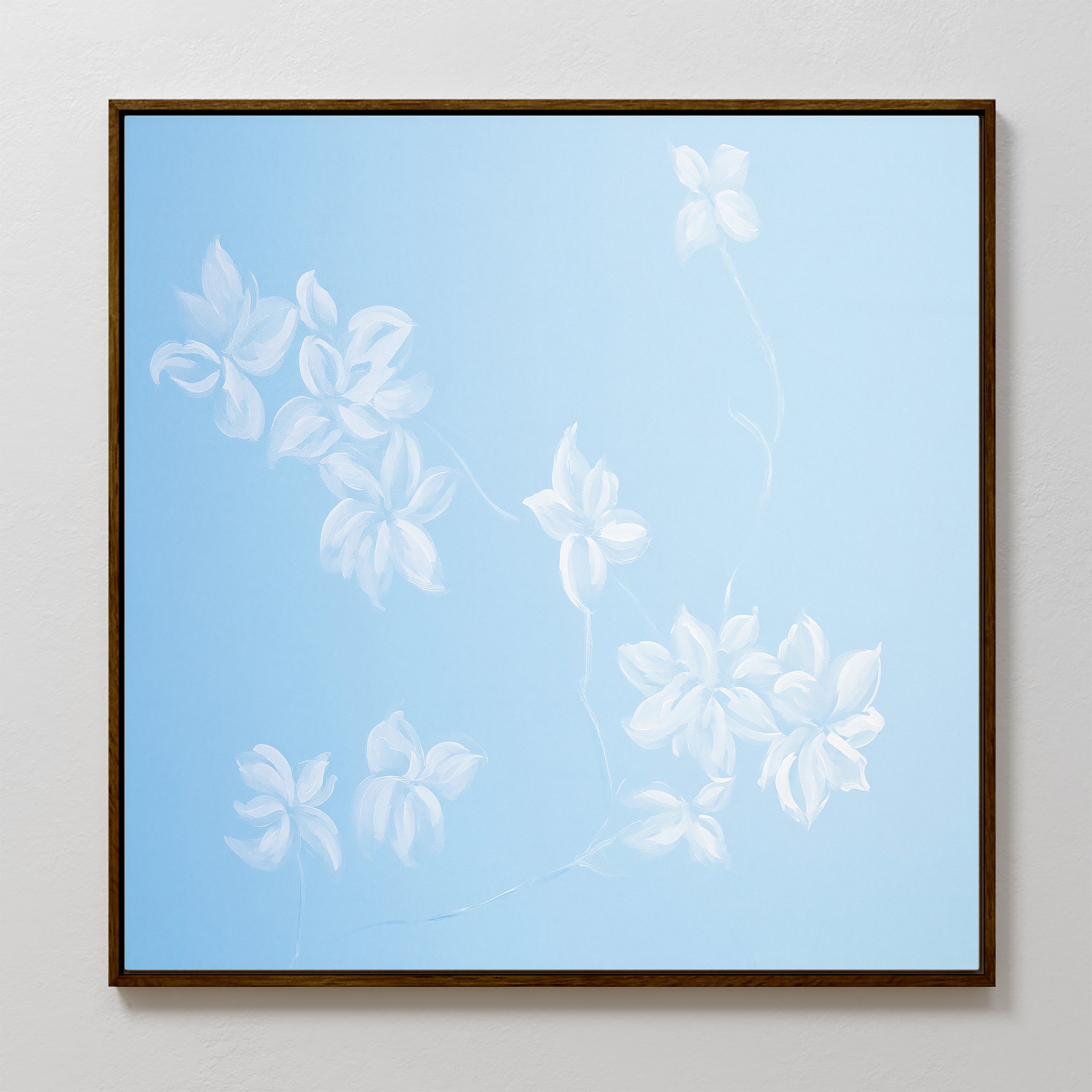 The Gentle Blossoms Canvas Art - Square features delicate white floral outlines on a smooth light blue background, creating minimalistic and airy wall art with beautifully dispersed flowers.