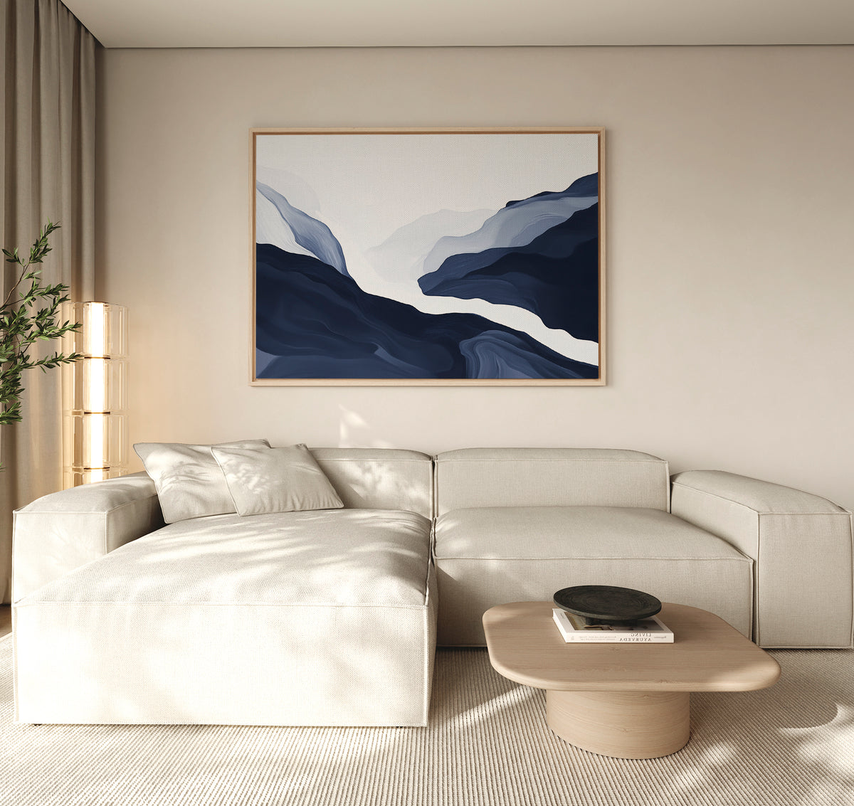 A modern living room featuring a beige sectional sofa, light wood coffee table, black decorative bowl, tall plant, and the Glacier Flow Canvas Art - Horizontal above the sofa. Neutral tones and modern décor create a calm, minimalist vibe.