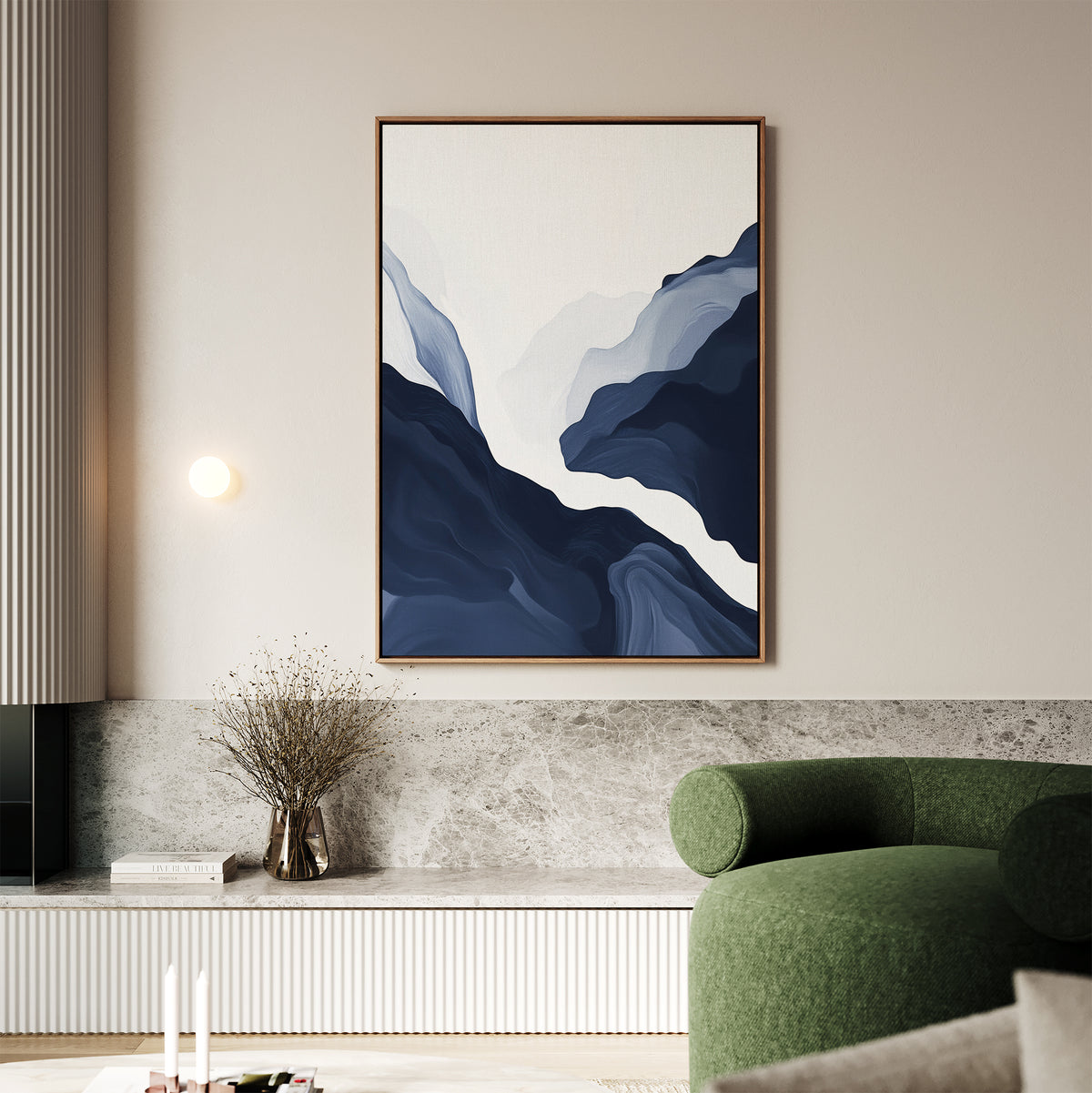 A modern living room with a green sofa, marble accents, a small vase with dried branches, and the Glacier Flow Canvas Art - Vertical—a striking blue and white abstract piece—adds the perfect touch of modern home decor.