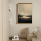 Minimalist living room with a beige sofa, light wood wall and shelves, a small geometric sculpture, and the Golden Fog Horizon Canvas Art - Vertical in soft beige and dark tones hanging above the couch.