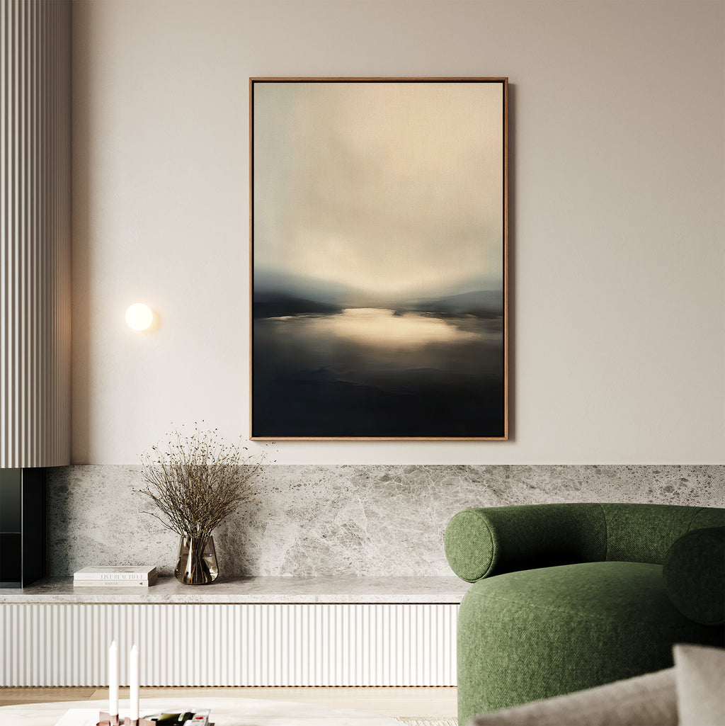 A modern living room with a green curved sofa, marble-topped low cabinet, glass vase with dried flowers, and the Golden Fog Horizon Canvas Art - Vertical in neutral tones hanging on the wall.