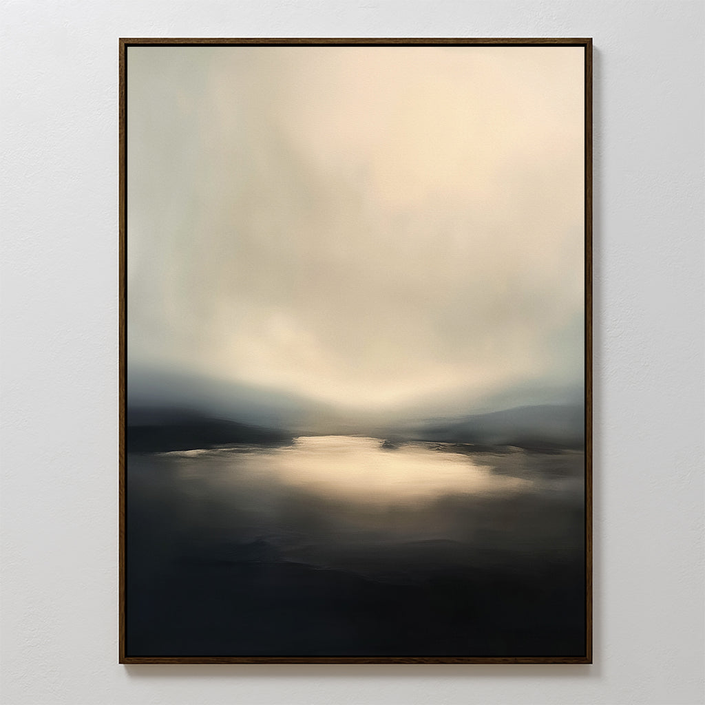 Golden Fog Horizon Canvas Art - Vertical features a moody, abstract landscape with soft beige, gray, and black tones. Gentle light reflects over water and distant hills beneath a calm sky in this serene framed print.