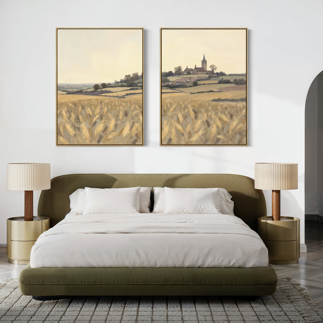 A modern bedroom with a green bed, white bedding, two gold nightstands with beige lamps, and the Harvest Chapel - Set of 2 canvas prints depicting countryside scenes hanging above the bed.