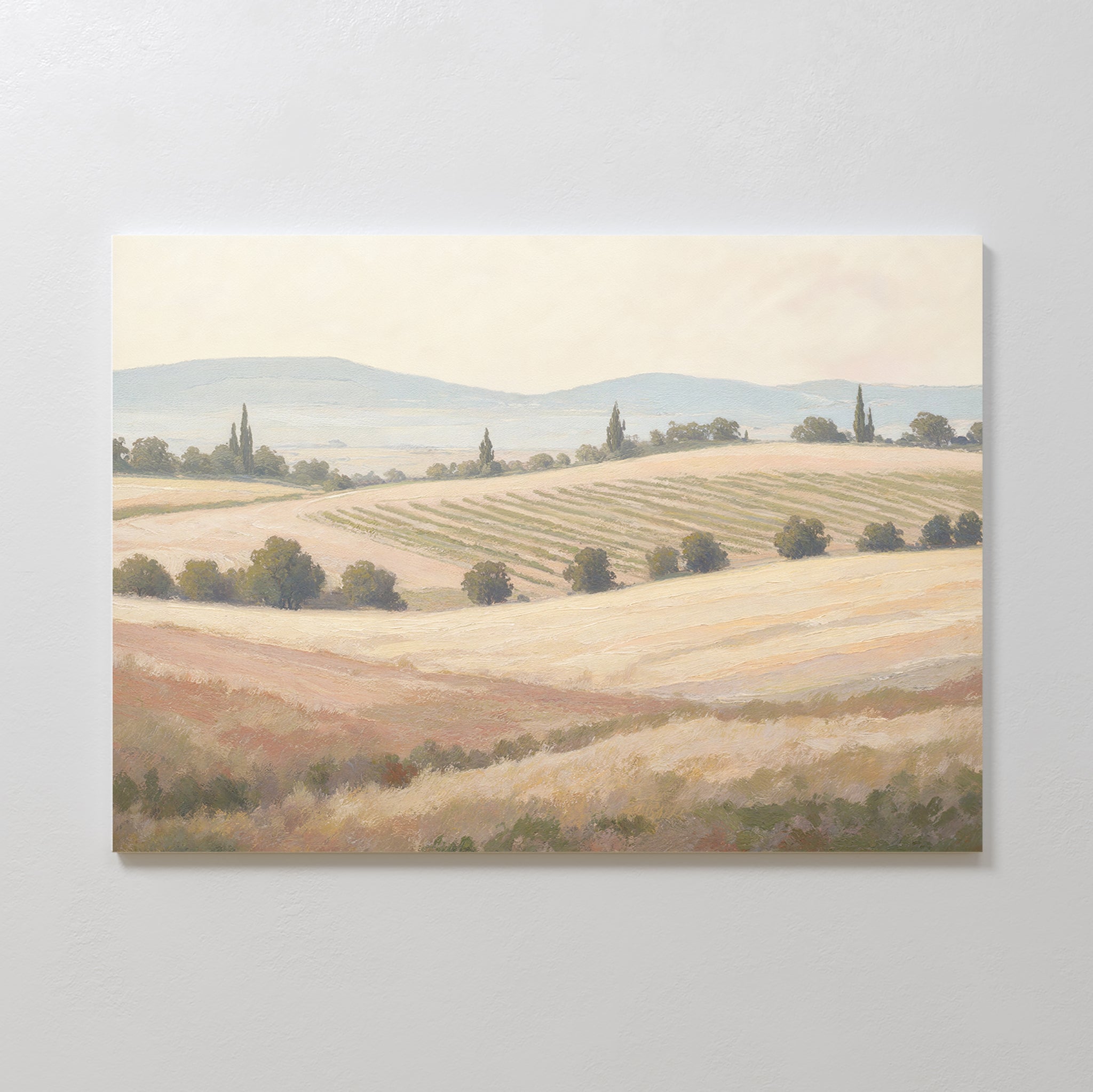 Harvest Fields Canvas Art - Horizontal features rolling hills, fields, and distant mountains under a pale sky. Soft earthy tones evoke a peaceful countryside mood—perfect decor for creating a tranquil rural atmosphere.