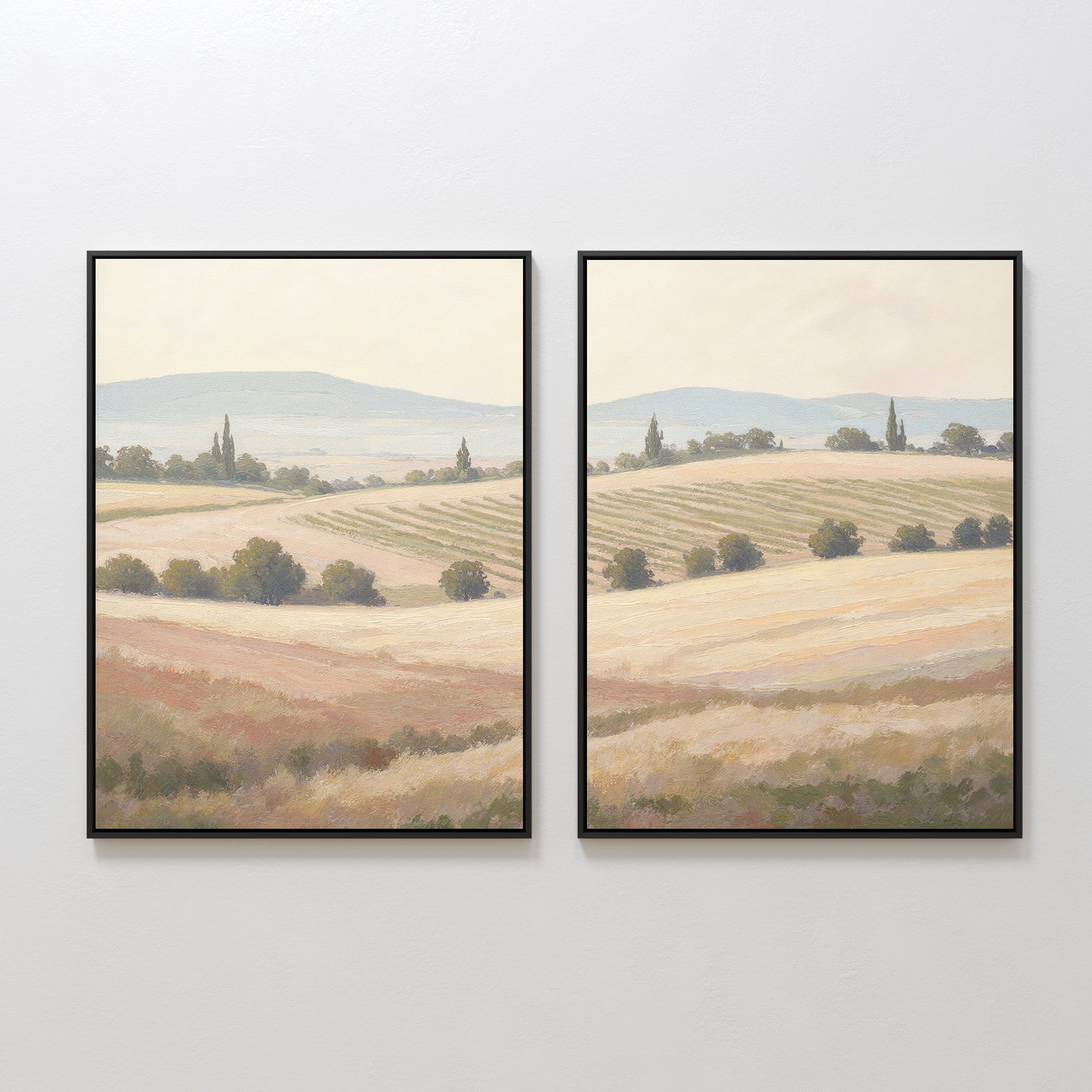 Harvest Fields - Set of 2 features framed landscape paintings side by side, with rolling fields, distant hills, and tall trees in soft earthy tones—ideal countryside wall art for serene farmhouse decor.