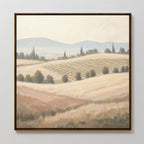 Add a touch of elegance to your space with the Harvest Fields Canvas Art - Square, featuring a soft countryside landscape with rolling hills, scattered trees, and distant mountains—ideal wall art for sophisticated country-inspired decor.