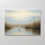Heron's Morning Canvas Art - Horizontal features a serene wetland scene with a white egret amid reeds and a cloudy sky reflected in calm water—earthy tones perfect for adding tranquil beauty to any space.