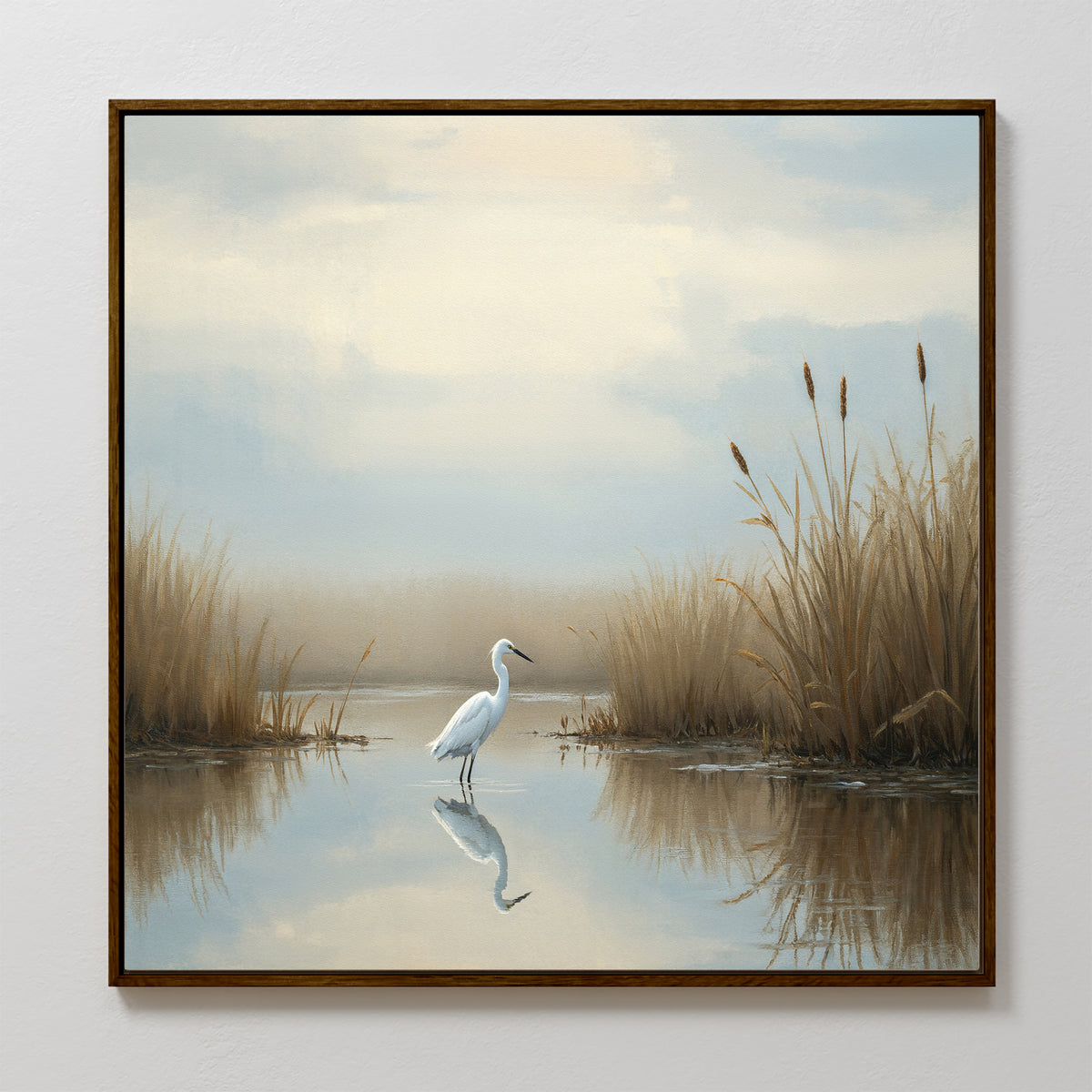 The Heron's Morning Canvas Art - Square features a serene white egret standing in shallow water among tall marsh grasses, its reflection glimmering under a gentle, cloudy sky—a tranquil wetland scene.