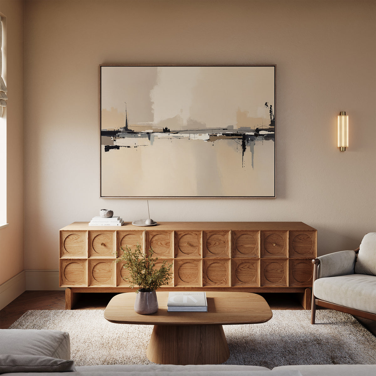 A modern living room with neutral tones features a wooden sideboard, the Industrial Cityscape Canvas Art - Horizontal above it, a low coffee table, a plush rug, and a light beige sofa.