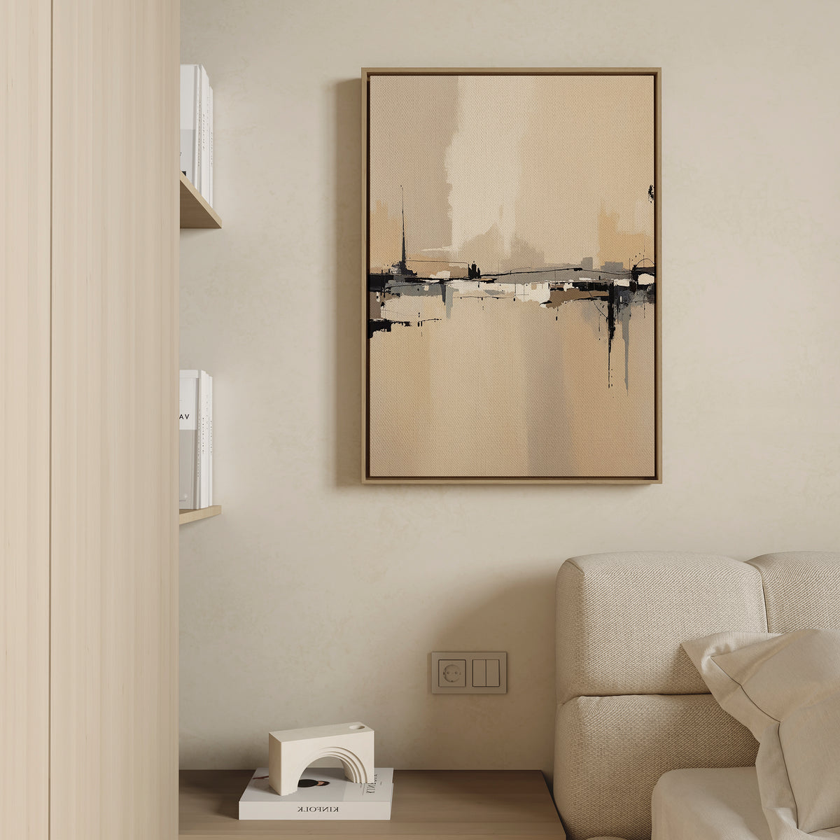 A modern living room featuring the Industrial Cityscape Canvas Art - Vertical, a white textured sofa, wooden bookshelf with books, and a geometric white sculpture on a side table. The minimalist decor has neutral tones.