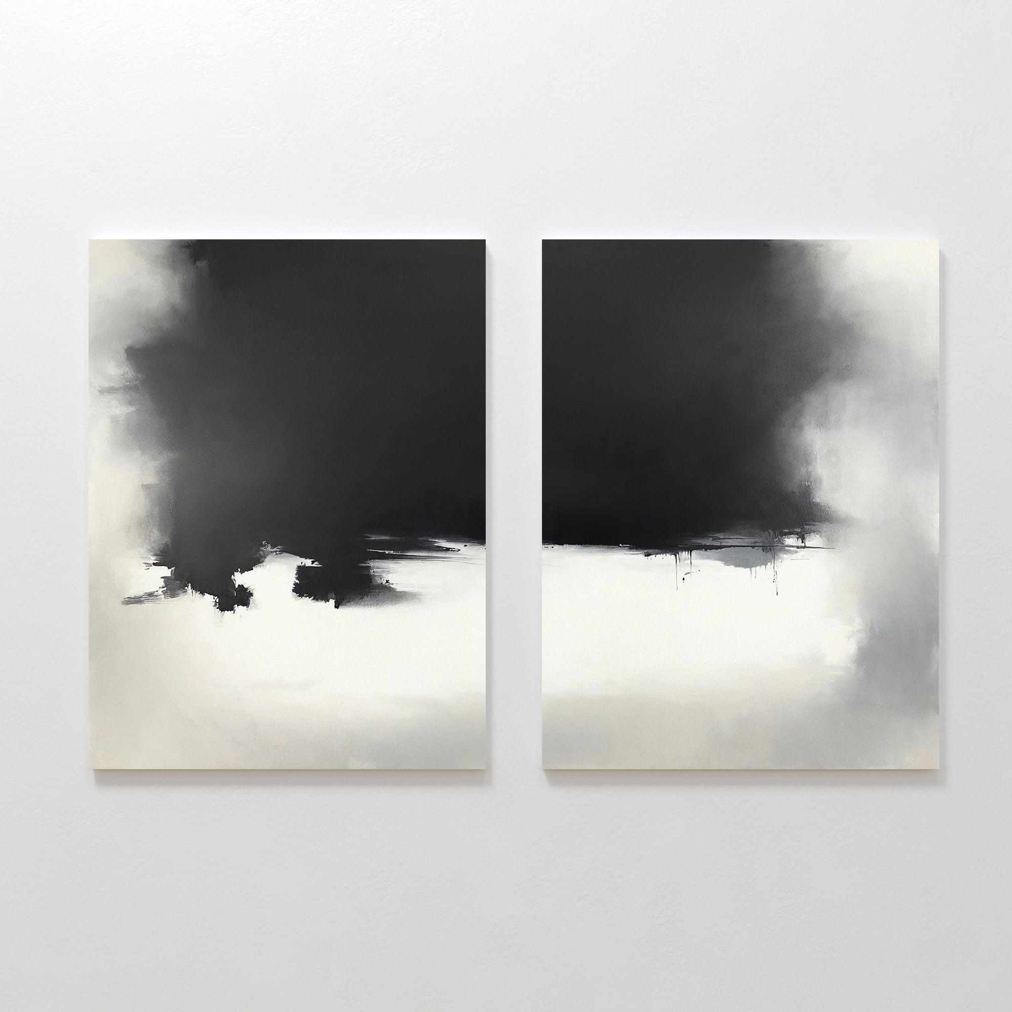 Ink Cloud Formation - Set Of 2 features abstract black-and-white paintings with dark, cloud-like forms blending into lighter areas, creating dramatic contrast and a sense of movement—modern wall art for striking impact.